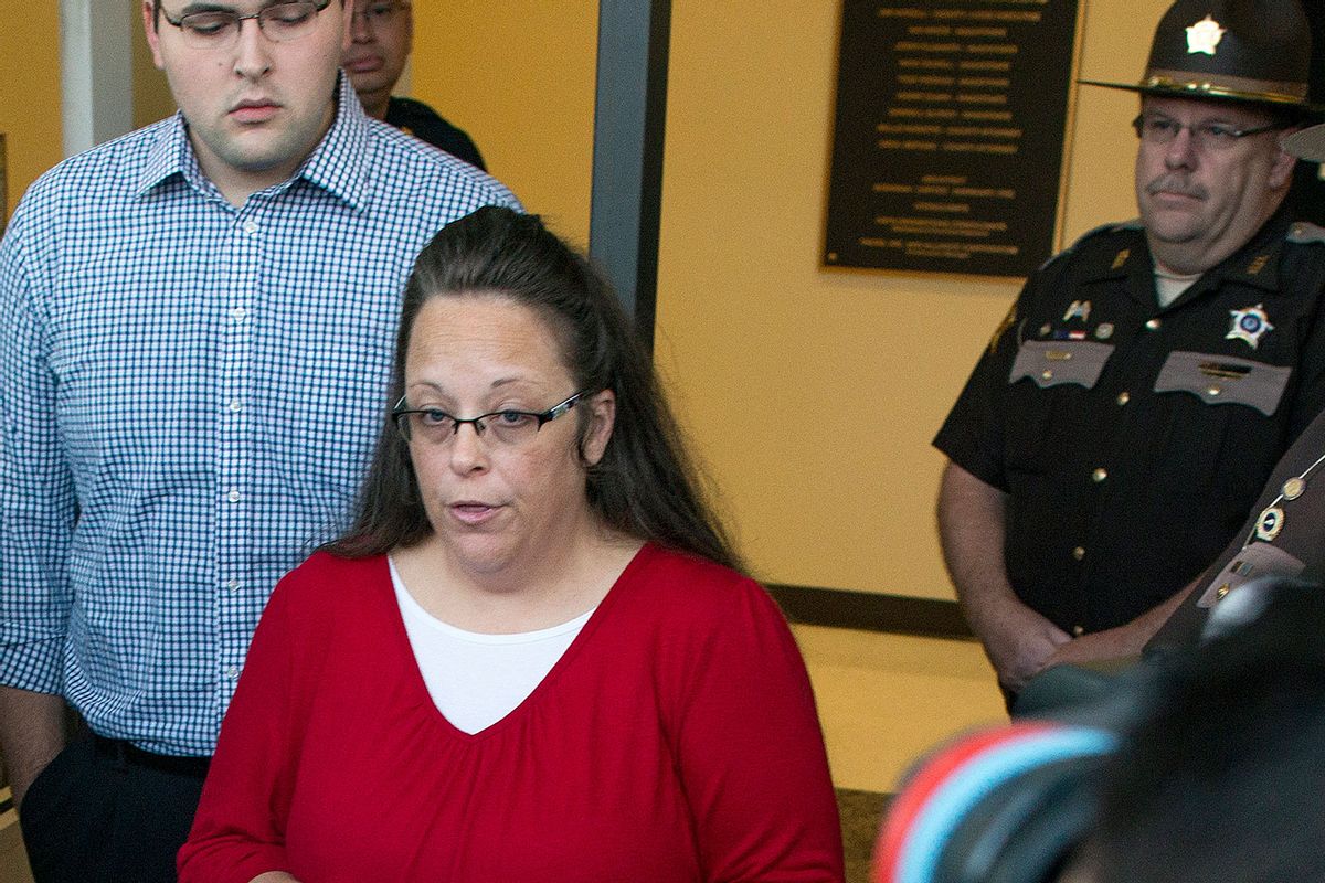 Rowan County clerk Kim Davis gives a statement about her intentions on applying her signature to same sex marriage licenses on her first day back to work, after being released from jail last week, at the Rowan County Courthouse September 14, 2015 in Morehead, Kentucky. (Ty Wright/Getty Images)