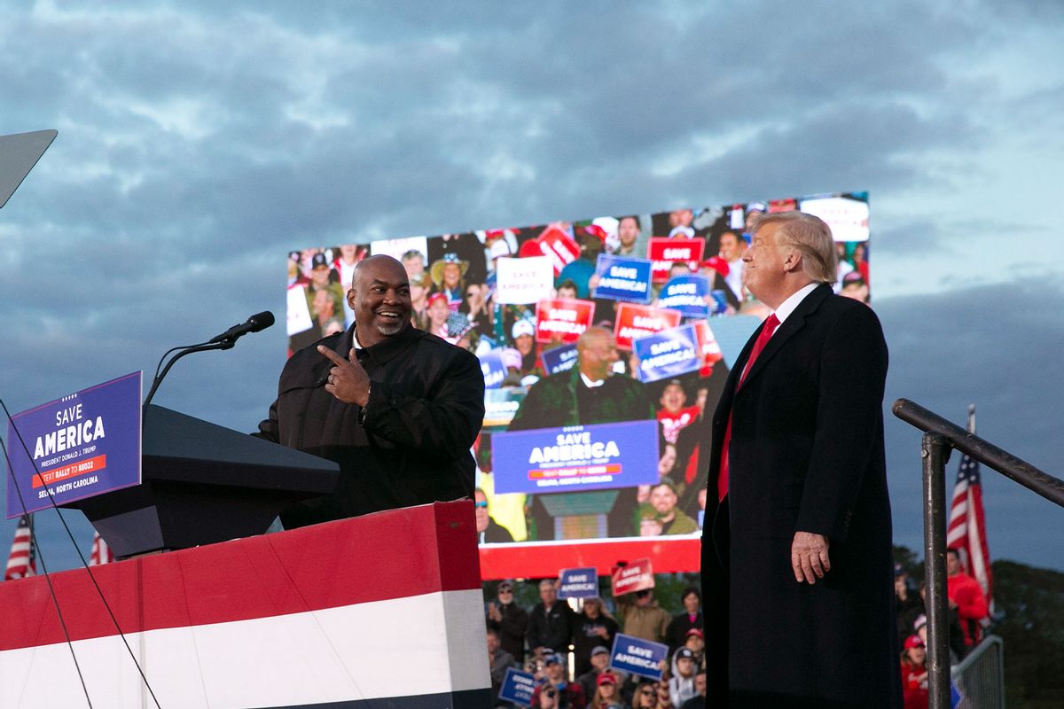 Lt. Gov. Mark Robinson joins the stage with former U.S. President Donald Trump during a rally at The Farm at 95 on April 9, 2022 in Selma, North Carolina. (Allison Joyce/Getty Images)