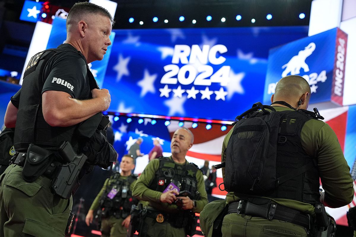 Law enforcement officers from Palm Beach County, Florida stand in the Fiserv Forum as preparations are underway for the Republican National Convention (RNC) on July 14, 2024, in Milwaukee, Wisconsin. (Andrew Harnik/Getty Images)