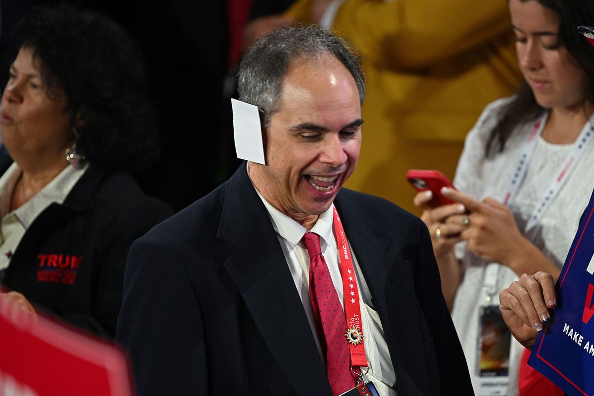 An attendee wears a paper "bandage" on the second day of the Republican National Convention at the Fiserv Forum on July 16, 2024 in Milwaukee, Wisconsin. (Leon Neal/Getty Images)