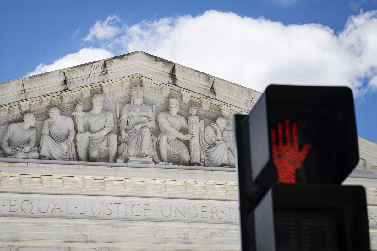 A stop sign is seen in front of the U.S. Supreme Court building in Washington DC, United States on June 01, 2024. (Celal Gunes/Anadolu via Getty Images)