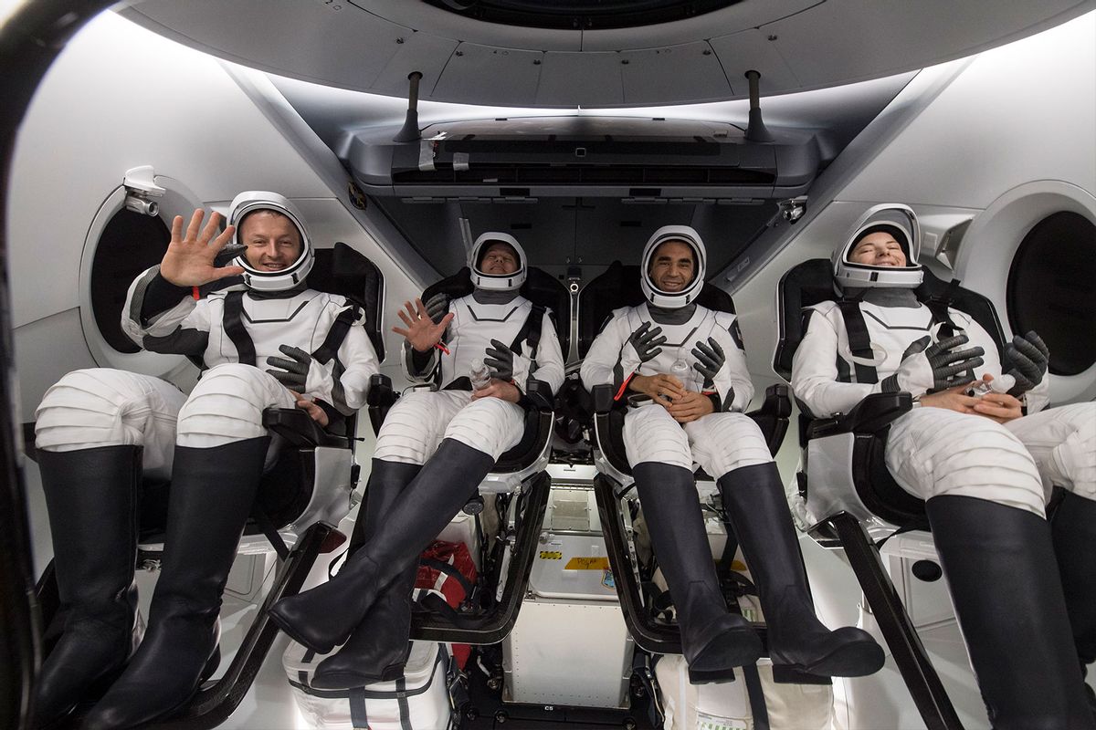 In this handout photo provided by NASA, (L-R) ESA (European Space Agency) astronaut Matthais Maurer, NASA astronauts Tom Marshburn, Raja Chari, and Kayla Barron, are seen inside the SpaceX Crew Dragon Endurance spacecraft onboard the SpaceX Shannon recovery ship shortly after having landed in the Gulf of Mexico on May 6, 2022 off the coast of Tampa, Florida. (Aubrey Gemignani/NASA via Getty Images)