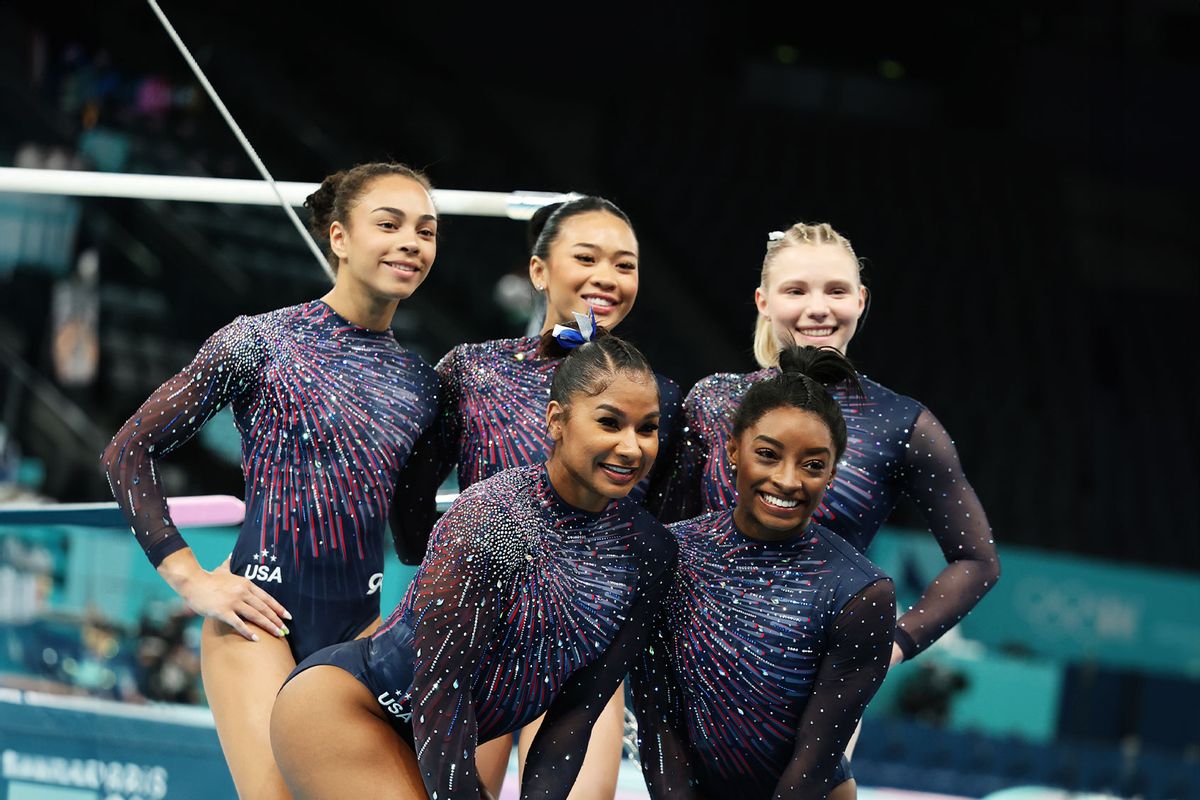 Hezly Rivera, Sunisa Lee, Jade Carey, Jordan Chiles and Simone Biles of Team United States pose for a photo during a Gymnastics training session in the Bercy Arena ahead of the Paris 2024 Olympic Games on July 25, 2024 in Paris, France. (Naomi Baker/Getty Images)