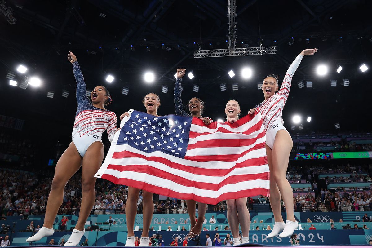 Jordan Chiles, Hezly Rivera, Simone Biles, Sunisa Lee and Jade Carey of Team United States celebrate winning the gold medal during the Artistic Gymnastics Women's Team Final on day four of the Olympic Games Paris 2024 at Bercy Arena on July 30, 2024 in Paris, France. (Naomi Baker/Getty Images)