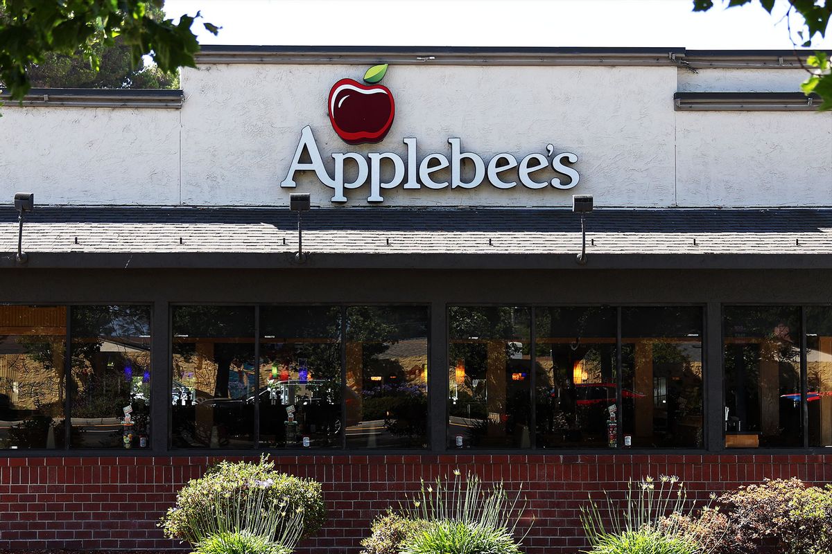 A sign is posted in front of an Applebee's restaurant on June 12, 2024 in Hayward, California. (Justin Sullivan/Getty Images)