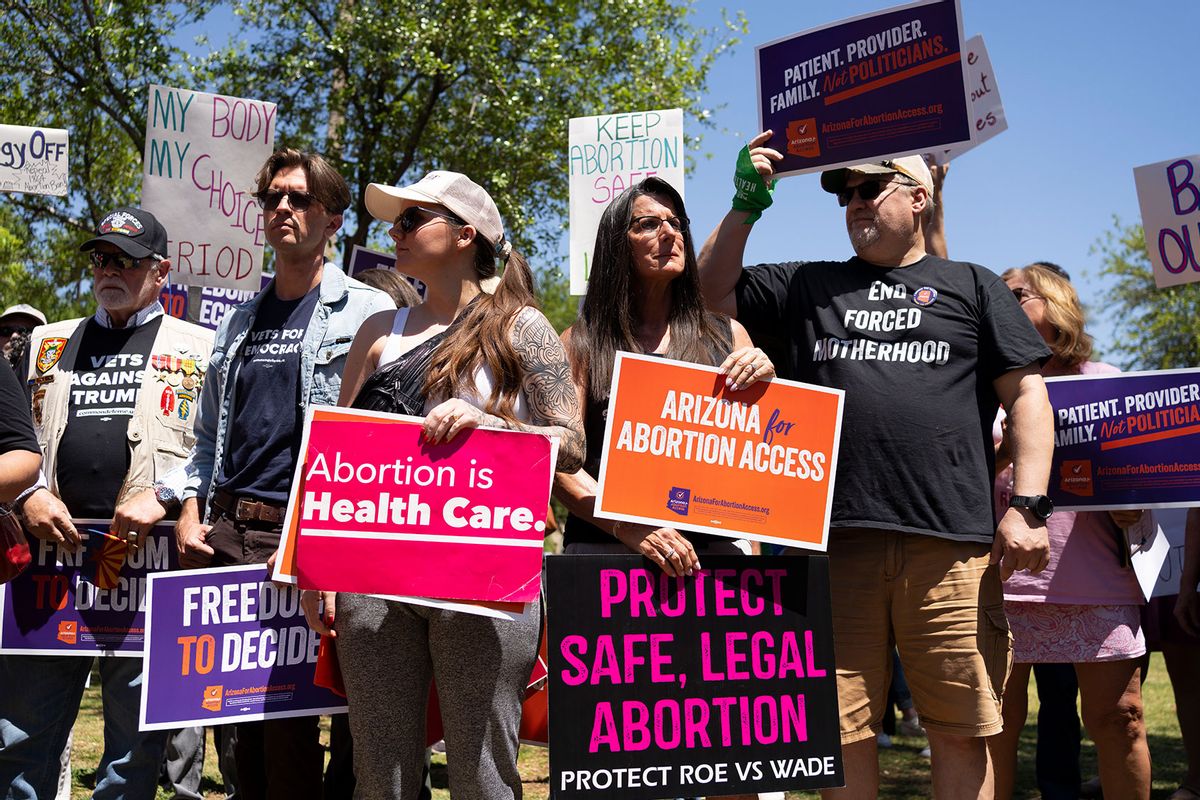 Members of Arizona for Abortion Access, the ballot initiative to enshrine abortion rights in the Arizona State Constitution, hold a press conference and protest condemning Arizona House Republicans and the 1864 abortion ban during a recess from a legislative session at the Arizona House of Representatives on April 17, 2024 in Phoenix, Arizona. (Rebecca Noble/Getty Images)