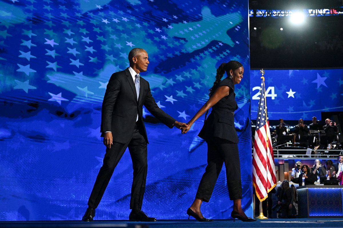 Former president Barack Obama on stage with Former first lady Michelle Obama during day 2 of the Democratic National Convention at the United Center on August 20, 2024 in Chicago, Illinois. (Ricky Carioti/The Washington Post via Getty Images)