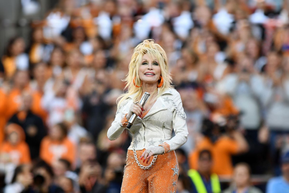 Dolly Parton performs during the college football game between the Georgia Bulldogs and the Tennessee Volunteers on November 18, 2023, at Neyland Stadium in Knoxville, TN. (Jeffrey Vest/Icon Sportswire via Getty Images)