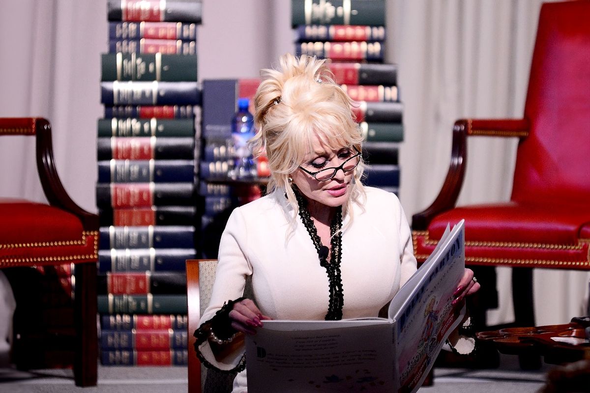 Singer Dolly Parton reads her book, "The Coat of Many Colors" to schoolchildren at The Library of Congress on February 27, 2018 in Washington, DC. (Shannon Finney/Getty Images)