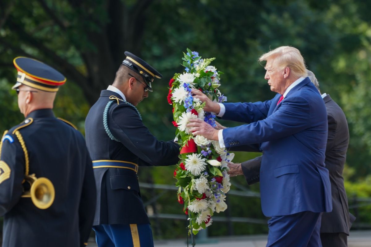 Donald Trump visits Arlington Cemetery to pay tribute to the 13 servicemembers killed during the Afghanistan evacuation. (Andrew Leyden/NurPhoto via Getty Images)