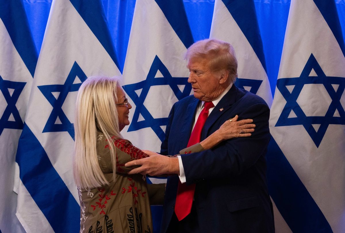 Republican presidential candidate, former U.S. President Donald Trump embraces Miriam Adelson at a fighting anti-semitism event, at the Trump National Golf Club Bedminster on August 15, 2024 in Bedminster, New Jersey.  (Adam Gray/Getty Images)