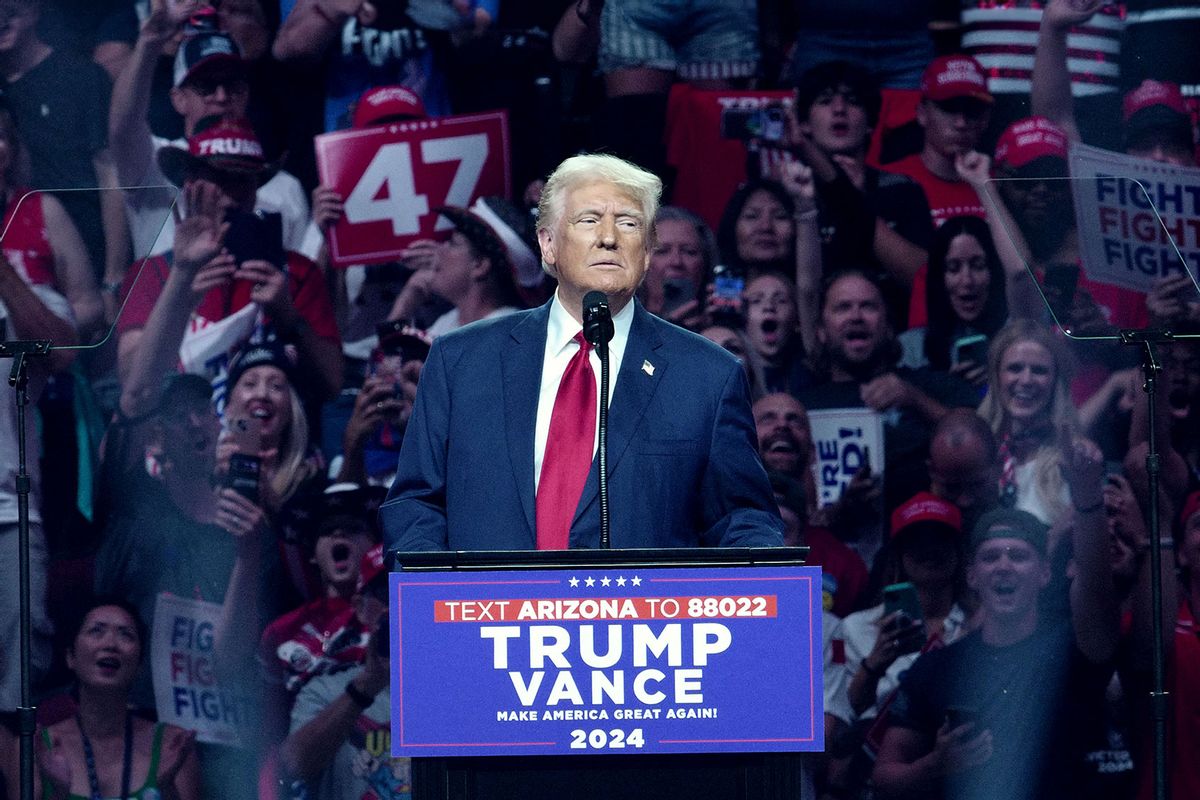 Former US President and Republican presidential candidate Donald Trump gestures as he speaks during a campaign rally at the Desert Diamond Arena in Glendale, Arizona, August 23, 2024. (OLIVIER TOURON/AFP via Getty Images)