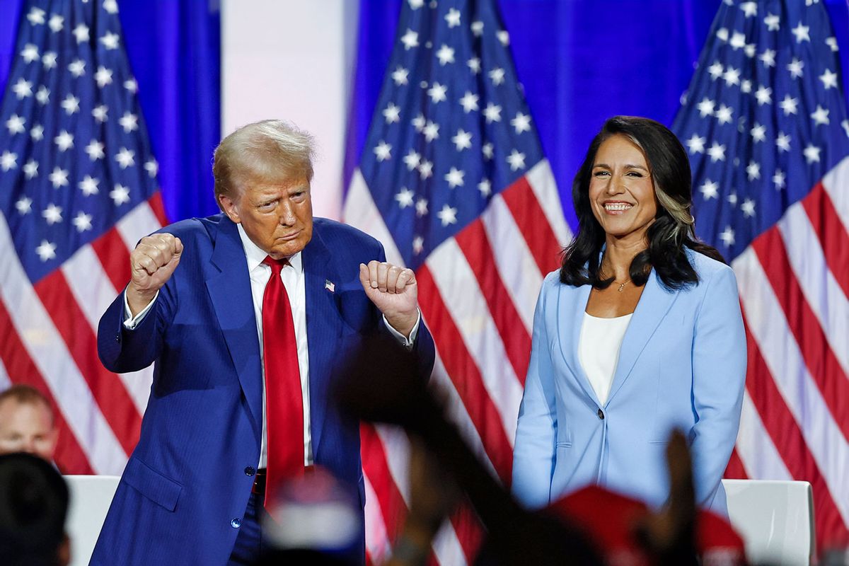 Former US President and Republican presidential candidate Donald Trump (L) dances as he leaves the stage after speaking alongside former US Representative Tulsi Gabbard during a town hall meeting in La Crosse, Wisconsin, on August 29, 2024. (KAMIL KRZACZYNSKI/AFP via Getty Images)