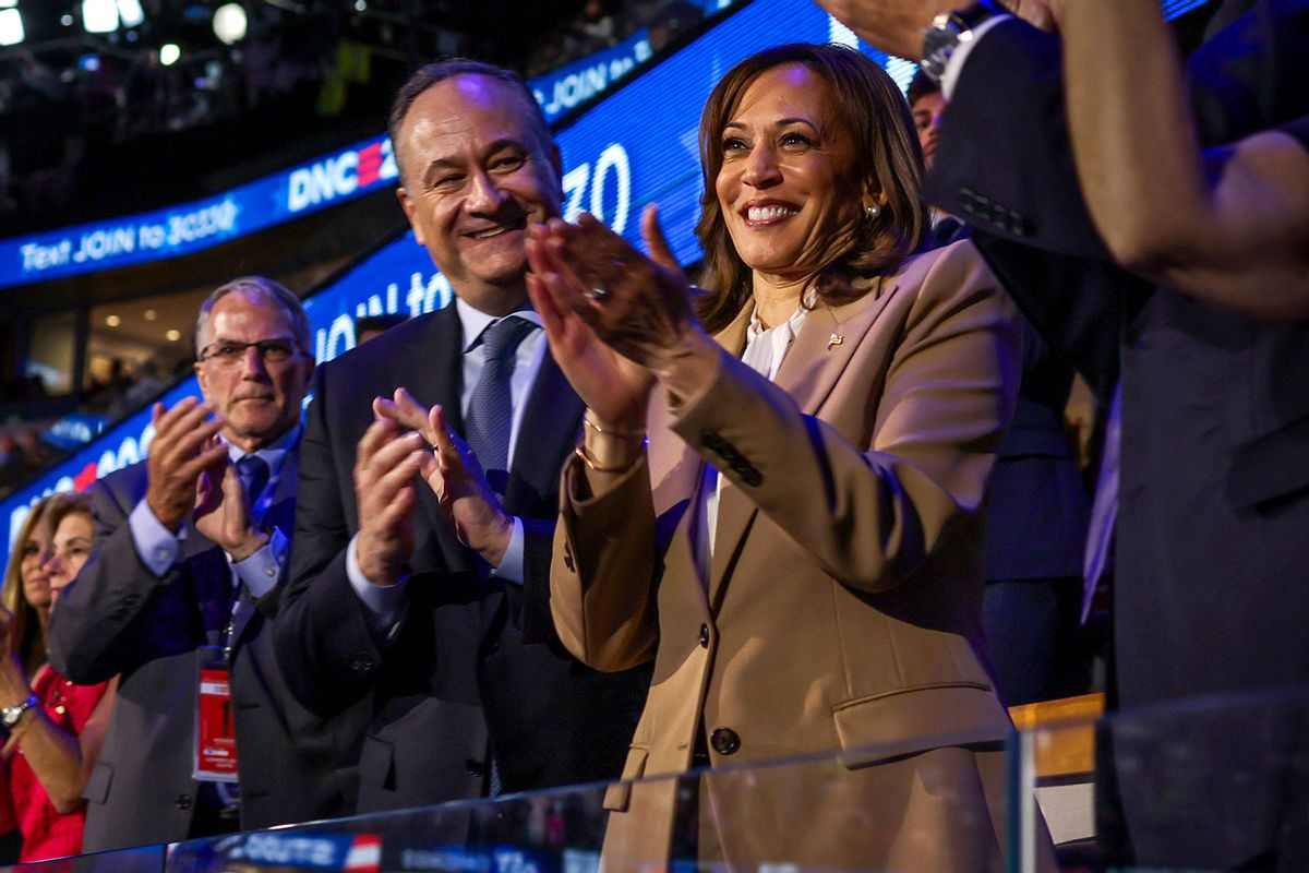 Second gentleman Doug Emhoff, Democratic and presidential nominee Vice President Kamala Harris clap during the Democratic National Convention, Monday, Aug. 19, 2024, in Chicago. (Gabrielle Lurie/San Francisco Chronicle via Getty Images)