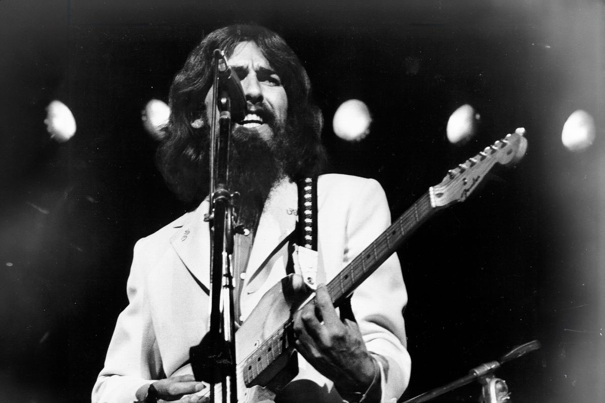 George Harrison performs onstage at the Concert for Bangladesh which was held at Madison Square Garden on August 1, 1971 in New York City, New York. (Michael Ochs Archives/Getty Images)