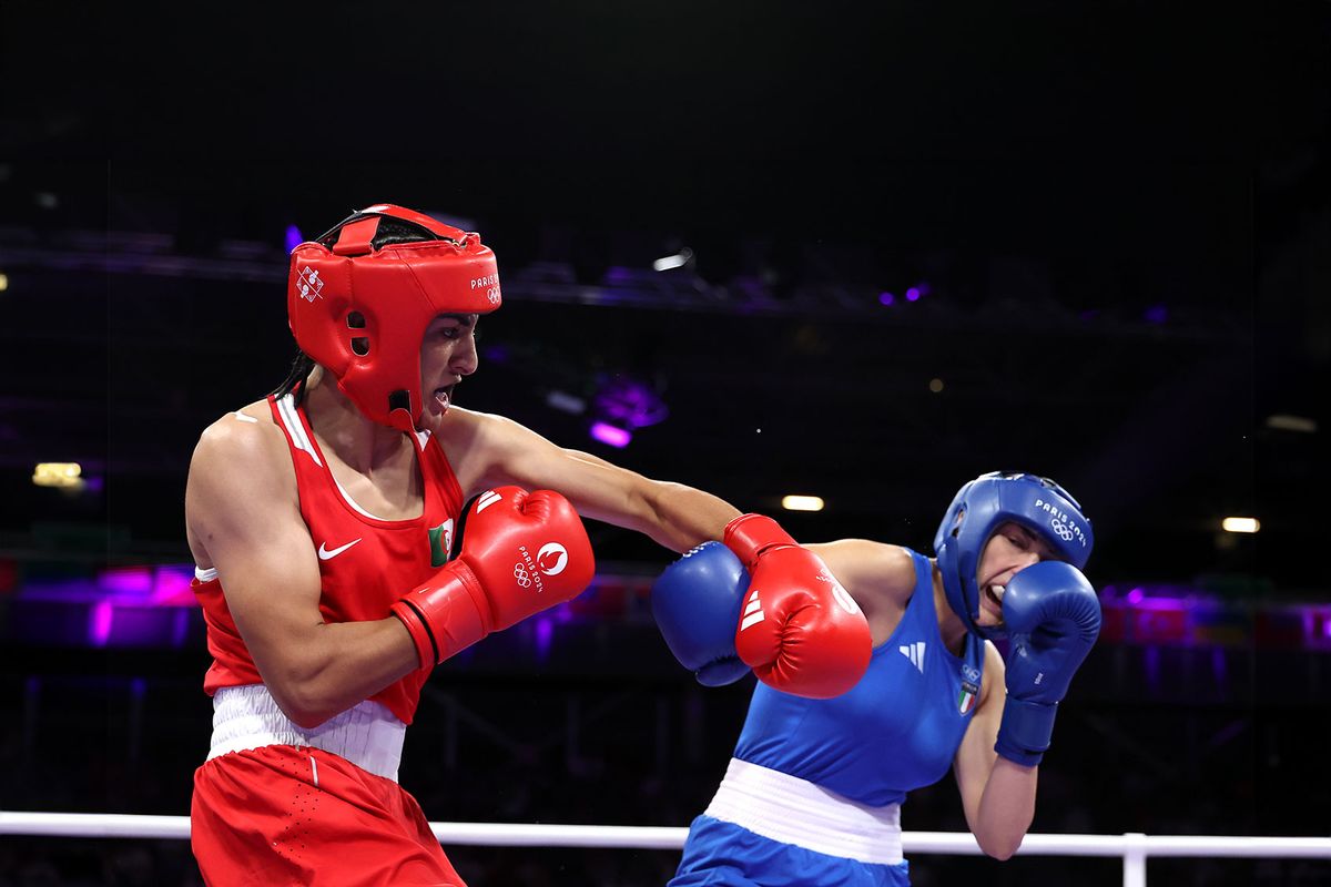 Imane Khelif of Team Algeria and Angela Carini of Team Italy exchange punches during the Women's 66kg preliminary round match on day six of the Olympic Games Paris 2024 at North Paris Arena on August 01, 2024 in Paris, France. (Richard Pelham/Getty Images)