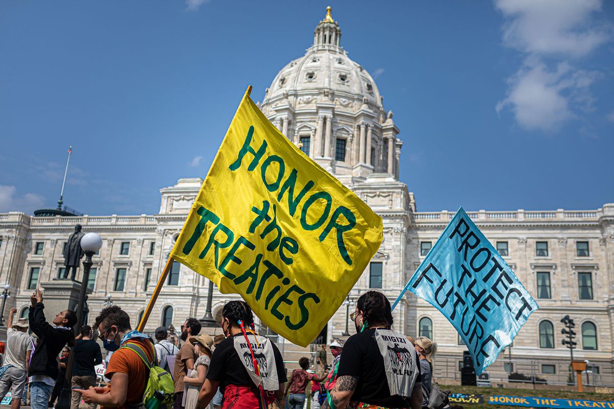 Indigenous leaders and their water-protector allies protest the Canadian oil-and-gas-transport company Enbridge, who are expanding the controversial Line 3 pipeline. (Michael Nigro/Pacific Press/LightRocket via Getty Images)