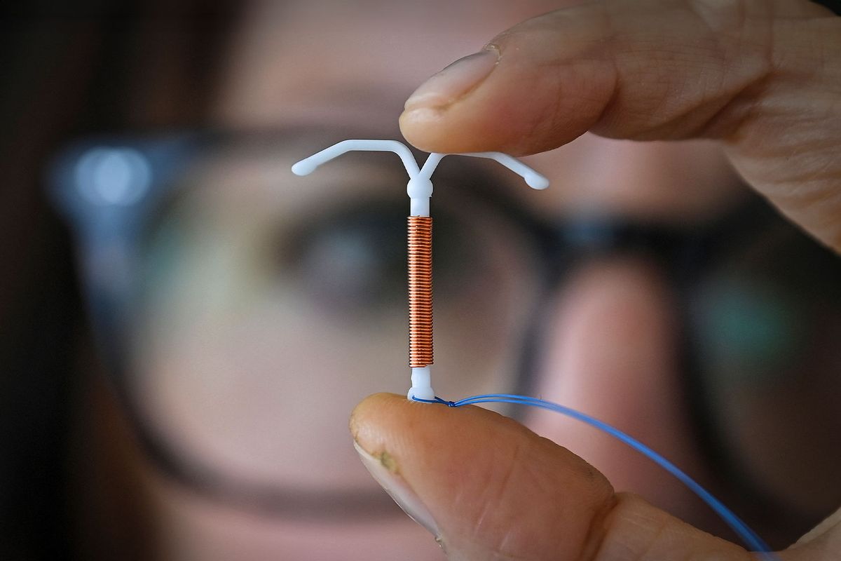 A copper IUD, intrauterine device (VALENTINE CHAPUIS/AFP via Getty Images)