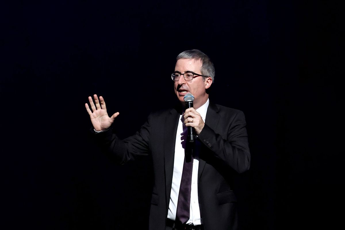 John Oliver performs onstage during 2023 Night of Too Many Stars benefiting NEXT for AUTISM at Beacon Theatre on December 11, 2023 in New York City. (Jamie McCarthy/Getty Images for Night of Too Many Stars)