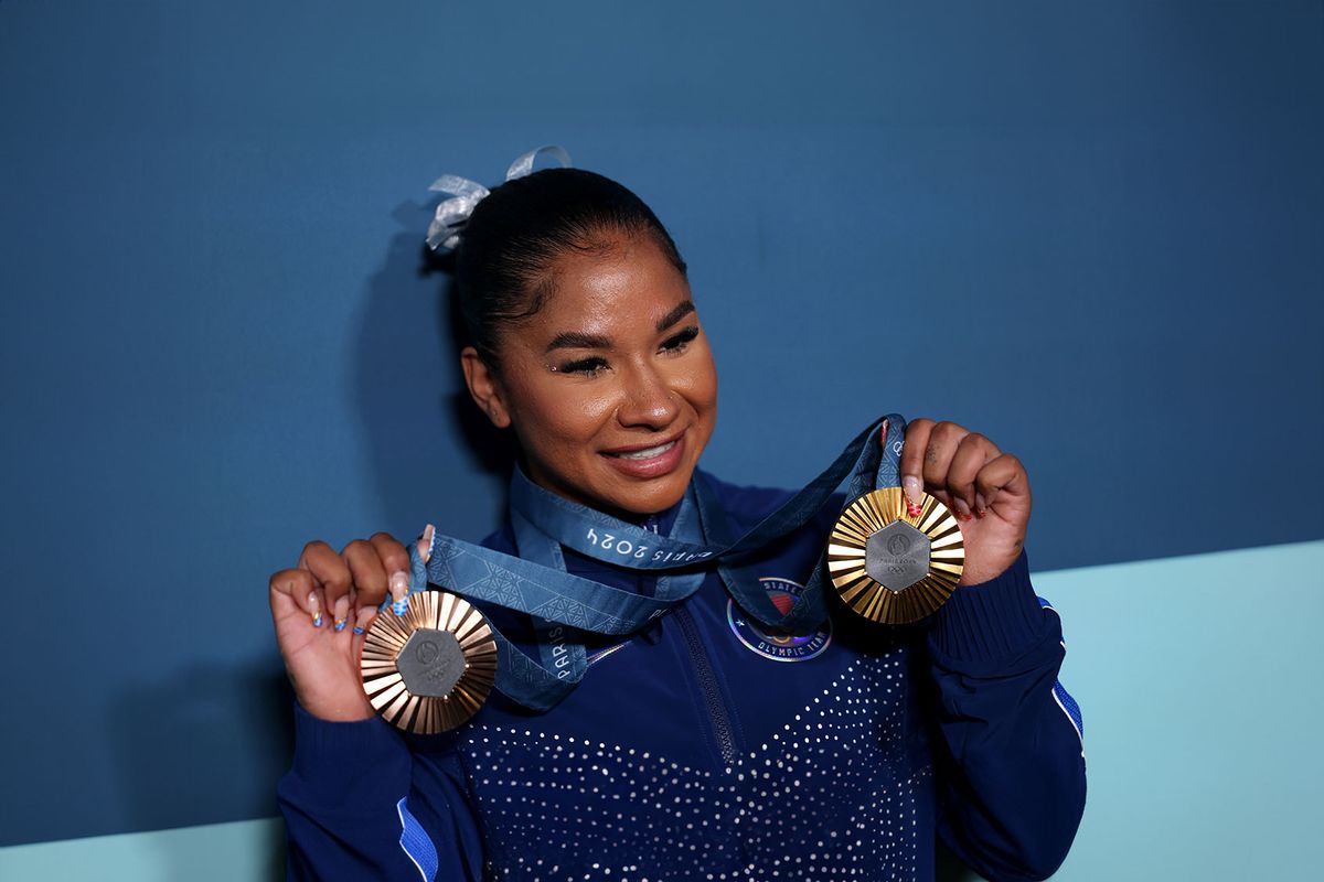 Jordan Chiles of Team United States poses with her Paris 2024 Olympic medals following the Artistic Gymnastics Women's Floor Exercise Final on day ten of the Olympic Games Paris 2024 at Bercy Arena on August 05, 2024 in Paris, France. (Naomi Baker/Getty Images)