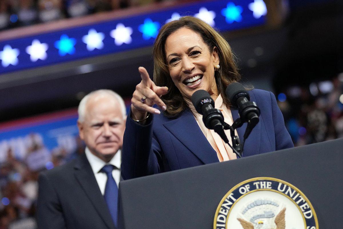 Democratic presidential candidate, U.S. Vice President Kamala Harris speaks as Democratic vice presidential candidate Minnesota Gov. Tim Walz looks on during a campaign event at the Liacouras Center at Temple University on August 6, 2024 in Philadelphia, Pennsylvania. (Andrew Harnik/Getty Images)