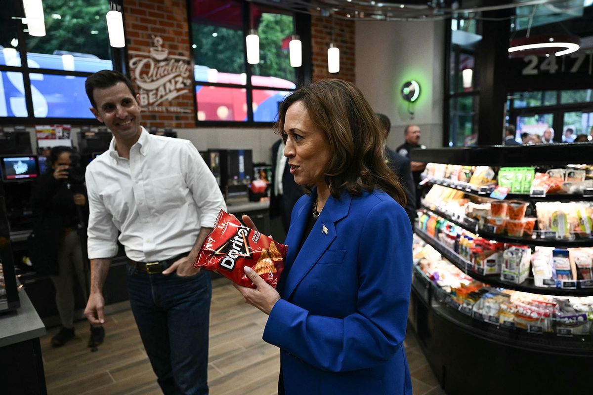 US Vice President and Democratic presidential candidate Kamala Harris holds a bag of Doritos chips during a stop at a Sheetz gas station in Coraopolis, Pennsylvania, on August 18, 2024. (ANGELA WEISS/AFP via Getty Images)