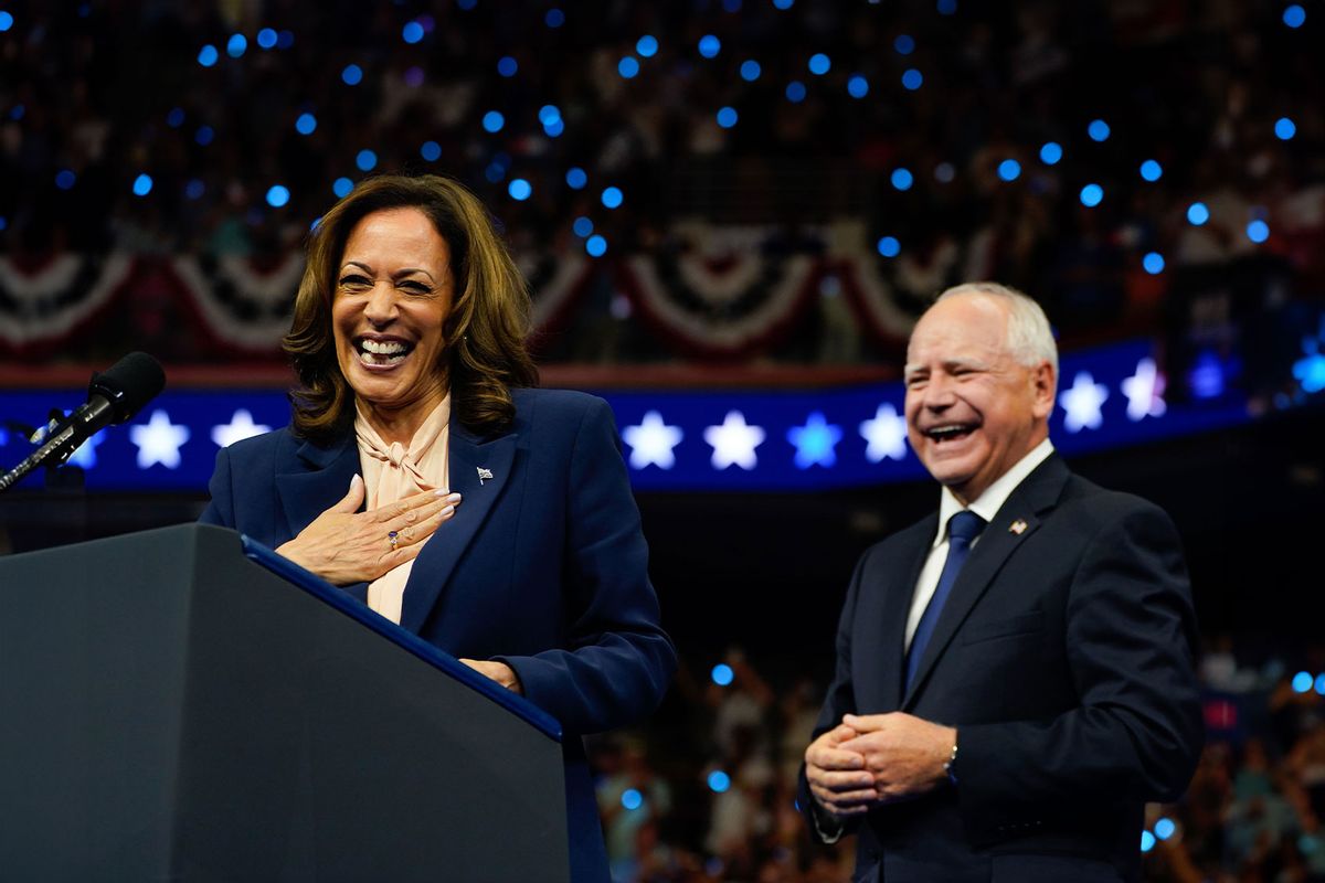 Vice President and Democratic presidential candidate Kamala Harris and Democratic vice presidential candidate Minnesota Gov. Tim Walz appear on stage together during a campaign event at Temple University's Liacouras Center in Philadelphia, Pa., on Tuesday, Aug. 6, 2024. (Demetrius Freeman/The Washington Post via Getty Images)