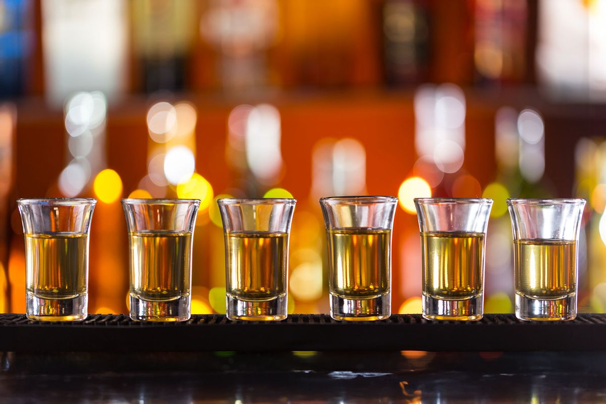 Line of shots at a bar counter (Getty Images/Jag_cz)