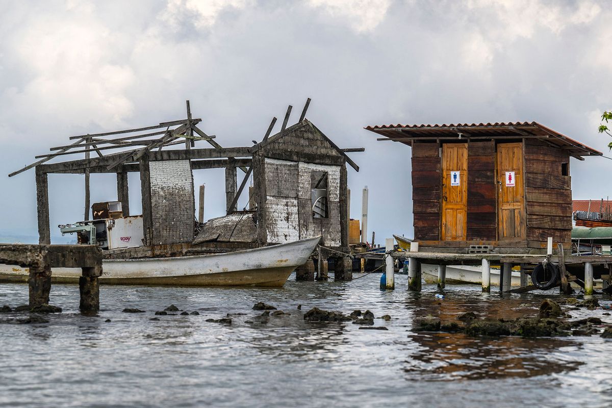 A house destroyed by the sea on the island of Carti Sugtupu, in the Indigenous Guna Yala Comarca, Panama, in the Caribbean Sea, is seen on August 30, 2023. (LUIS ACOSTA/AFP via Getty Images)