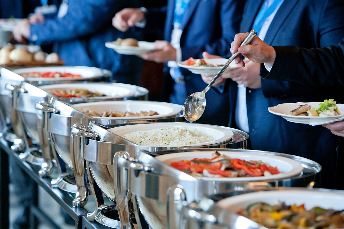 People at a buffet (Getty Images/sol_studio)