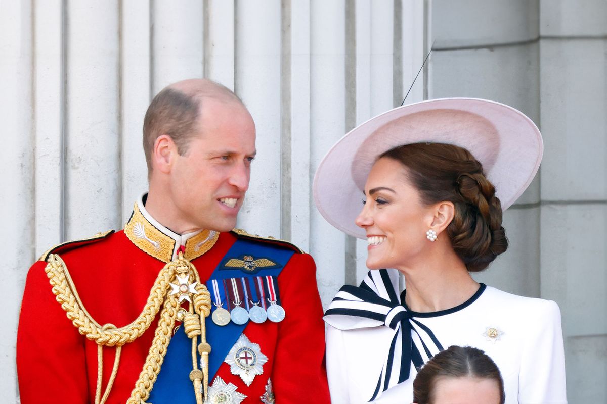 Prince William, Prince of Wales (Colonel of the Welsh Guards) and Catherine, Princess of Wales watch an RAF flypast from the balcony of Buckingham Palace after attending Trooping the Colour on June 15, 2024 in London, England. (Max Mumby/Indigo/Getty Images)