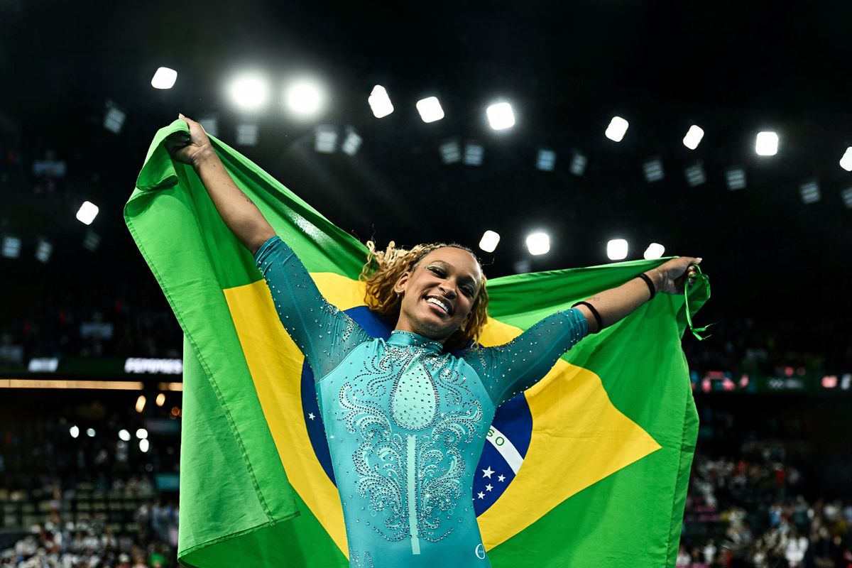 Brazil's Rebeca Andrade celebrates winning the gold medal at the end of the artistic gymnastics women's floor exercise final during the Paris 2024 Olympic Games at the Bercy Arena in Paris, on August 5, 2024. (GABRIEL BOUYS/AFP via Getty Images)