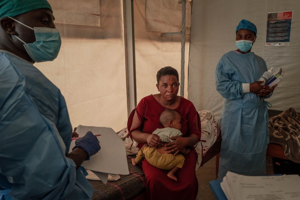 Health workers monitor Mpox patients at the Mpox treatment centre of the Nyiragongo general reference hospital, north of the city of Goma in the Democratic Republic of Congo, on August 16, 2024.  (GUERCHOM NDEBO / Contributor (Getty Images))