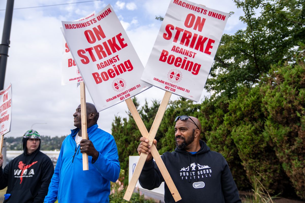 Boeing Machinists union members picket outside a Boeing factory on September 13, 2024 in Renton, Washington. The union voted overwhelmingly to reject the airplane maker's contract offer and strike. (Photo by Stephen Brashear/Getty Images)