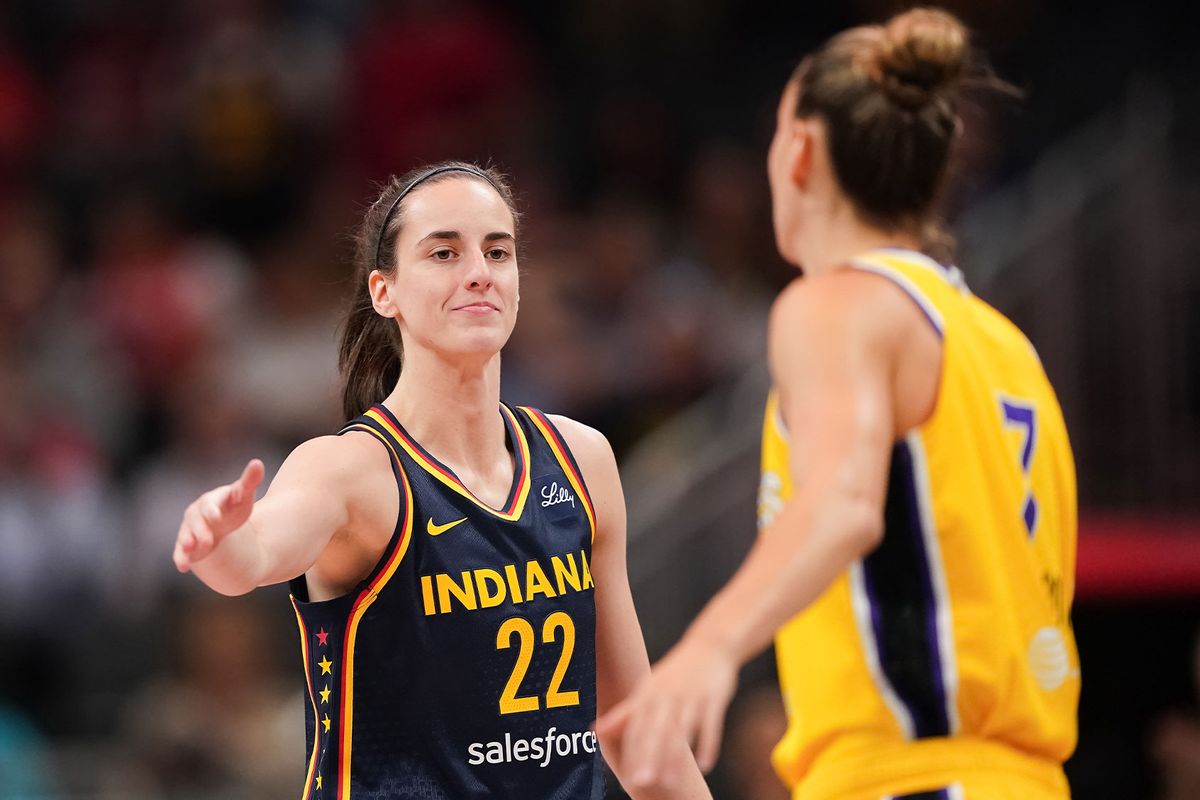 Caitlin Clark #22 of the Indiana Fever and Stephanie Talbot #7 of the Los Angeles Sparks meet before the game at Gainbridge Fieldhouse on September 04, 2024 in Indianapolis, Indiana. (Dylan Buell/Getty Images)