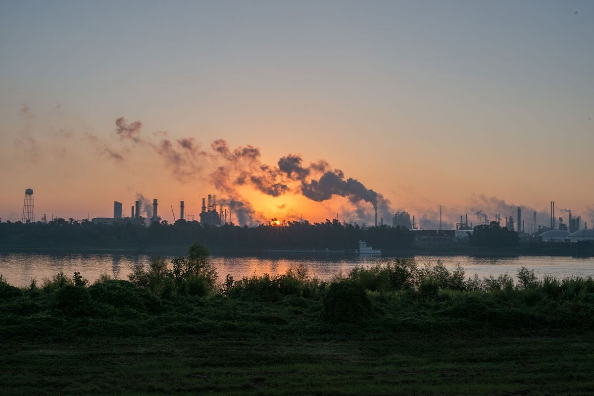 Smoke billows from one of many chemical plants in the area of Baton Rogue, Louisiana October 12, 2013. (Giles Clarke/Getty Images)