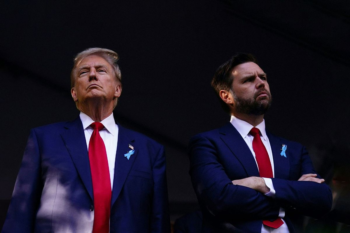 Former US President and Republican presidential candidate Donald Trump (L) and US Senator from Ohio and Republican vice presidential candidate J.D. Vance attend a remembrance ceremony on the 23rd anniversary of the September 11 terror attack on the World Trade Center at Ground Zero, in New York City on September 11, 2024. (ADAM GRAY/AFP via Getty Images)