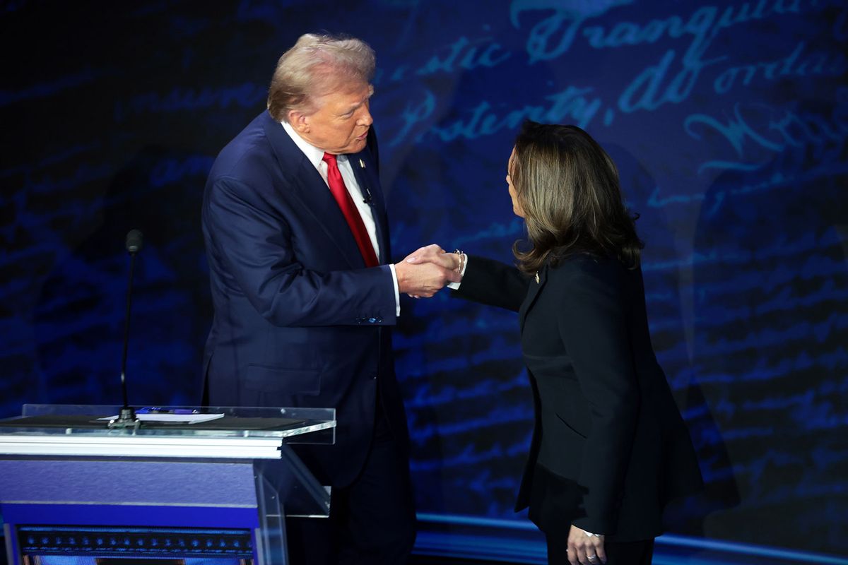 Republican presidential nominee, former U.S. President Donald Trump and Democratic presidential nominee, U.S. Vice President Kamala Harris greet as they debate for the first time during the presidential election campaign at The National Constitution Center on September 10, 2024 in Philadelphia, Pennsylvania. (Win McNamee/Getty Images)