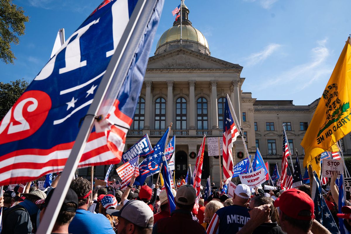 Protesters rally outside the Georgia State Capitol during a 'March for Trump' protest against the results of the 2020 Presidential election on November 21, 2020 in Atlanta, Georgia. (Elijah Nouvelage/Getty Images)