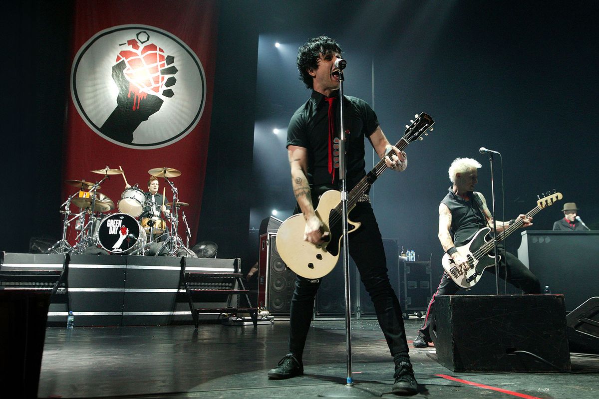 Tre Cool, Billie Joe Armstrong, and Mike Dirnt of the Californian band Green Day perform at the Carling Academy Brixton on January 25, 2005 in London. (Jo Hale/Getty Images)