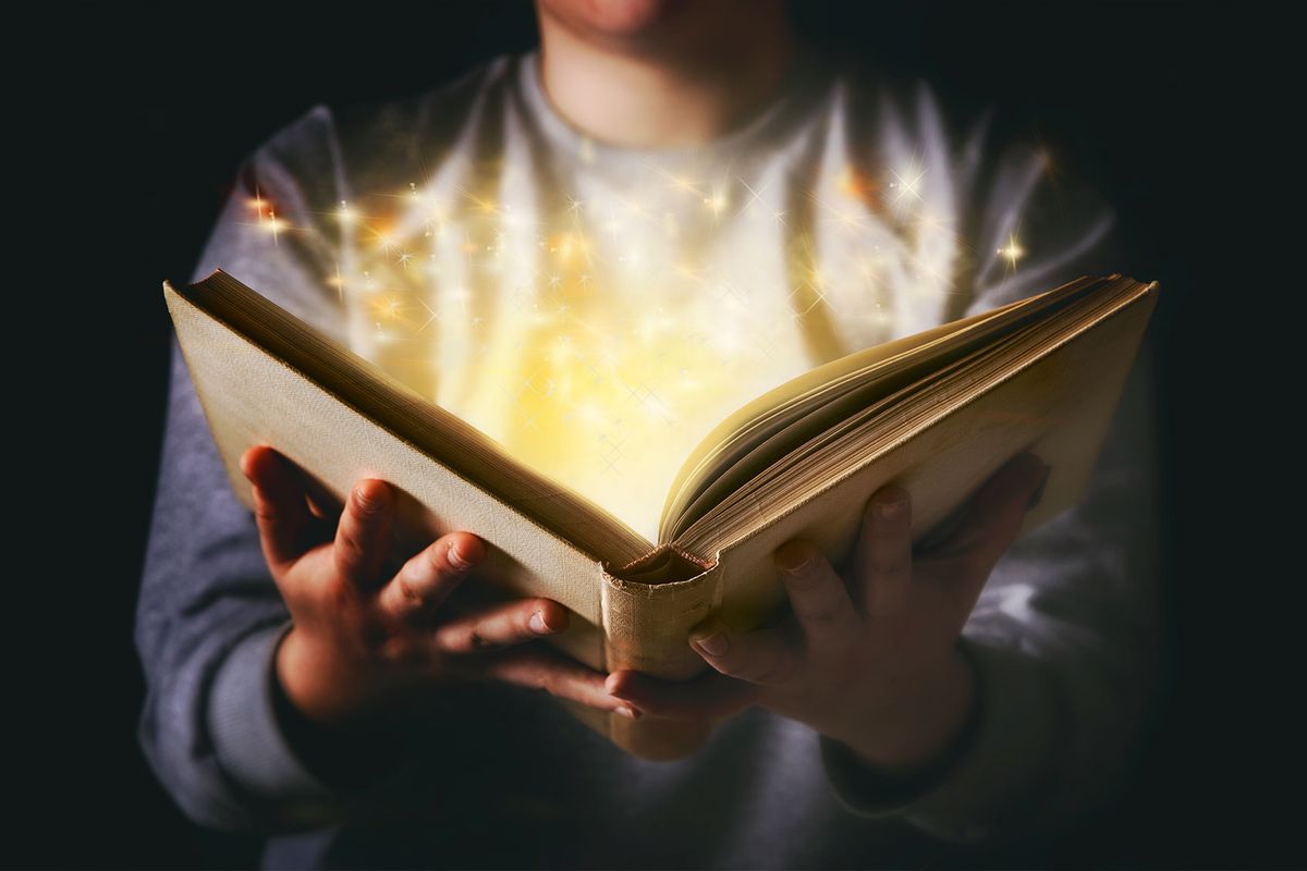 Light coming from book (Getty Images/filipfoto)