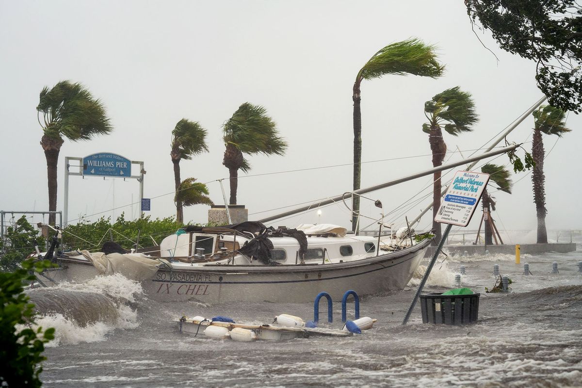 A boat washed ashore as storm surge affects Gulfport, Florida as Hurricane Helene passed through the Gulf of Mexico to the West on September 26, 2024. (Thomas Simonetti for The Washington Post via Getty Images)