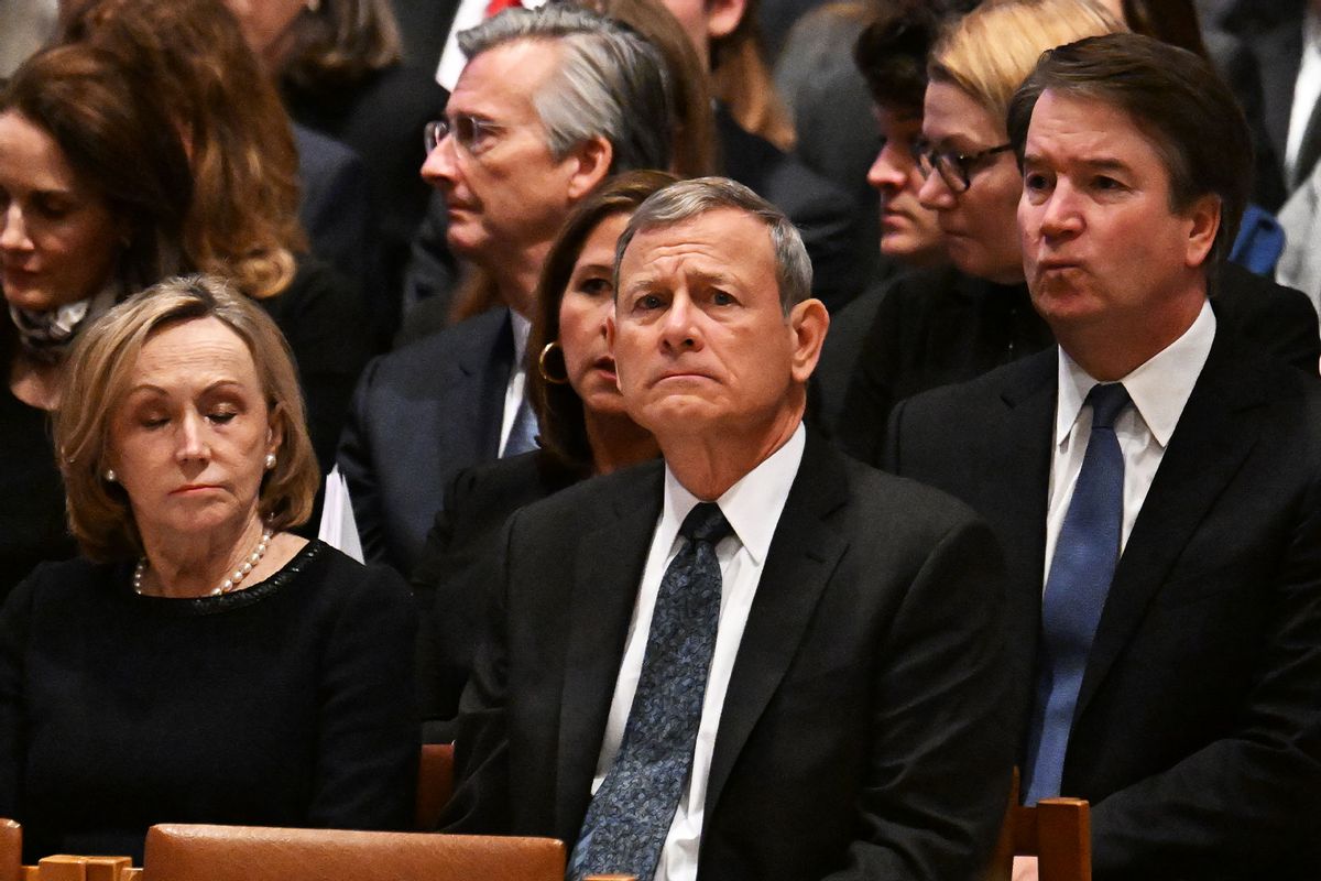 U.S. Supreme Court Chief Justice John Roberts (C), his wife Jane Sullivan and Supreme Court Associate Justice Brett Kavanaugh (R) attend the memorial service for late retired Supreme Court Justice Sandra Day O'Connor at the National Cathedral on December 19, 2023 in Washington, DC. (Jim Watson-Pool/Getty Images)