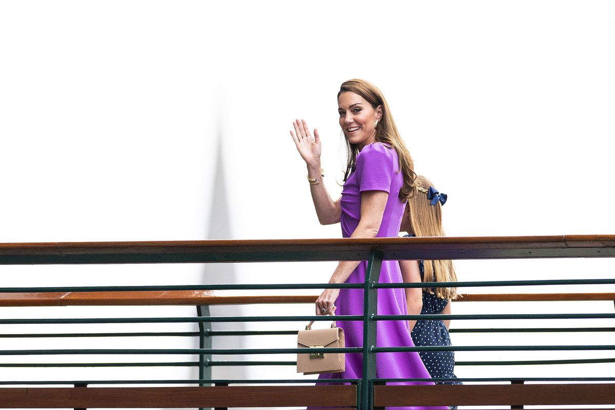 Catherine, Princess of Wales and Princess Charlotte of Wales walk across a bridge on the way to the Royal Box for the start of the Mens Singles Final at The Wimbledon Lawn Tennis Championship at the All England Lawn and Tennis Club at Wimbledon on July 14th, 2024 in London, England. (Simon Bruty/Anychance/Getty Images)