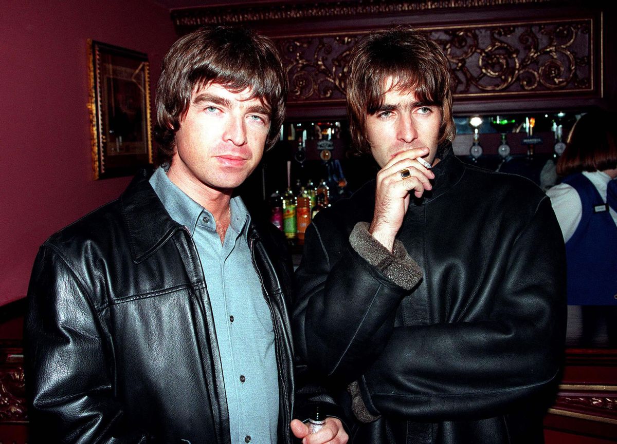 LONDON - 1995: Oasis lead singer Liam Gallagher and brother Noel Gallagher at the opening night of Steve Coogan's comedy show in the West End, London.  (Dave Hogan/Getty Images)