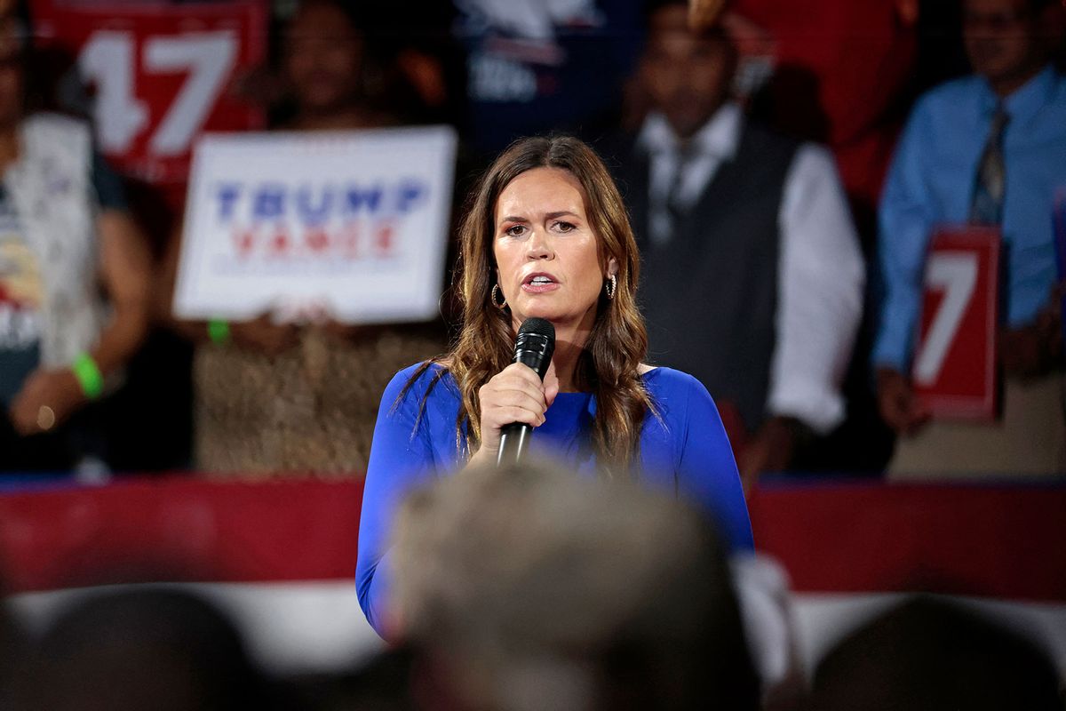 Arkansas Governor Sarah Huckabee Sanders moderates a town hall meeting with former US President and Republican presidential candidate Donald Trump at the Dort Financial Center in Flint, Michigan, on September 17, 2024. (JEFF KOWALSKY/AFP via Getty Images)