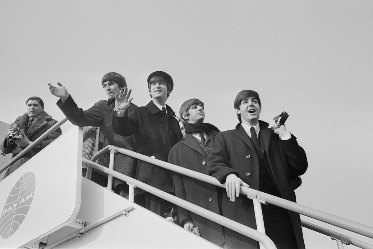 The Beatles at London Airport, en route to America, 13th February 1964. (Stan Meagher/Express/Hulton Archive/Getty Images)