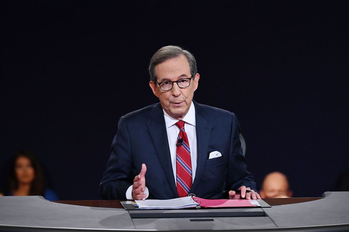 Debate moderator and Fox News anchor Chris Wallace directs the first presidential debate at Case Western Reserve University and Cleveland Clinic in Cleveland, Ohio, on September 29, 2020. (OLIVIER DOULIERY/POOL/AFP via Getty Images)