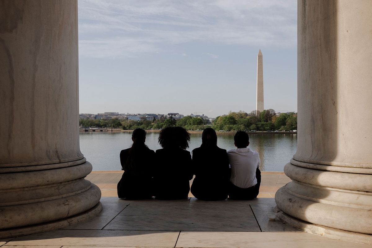 Four competitors in the We the People national championship viewed the Washington Monument from the Thomas Jefferson Memorial in Washington, D.C.

 (Moriah Ratner/Retro Report/PBS)