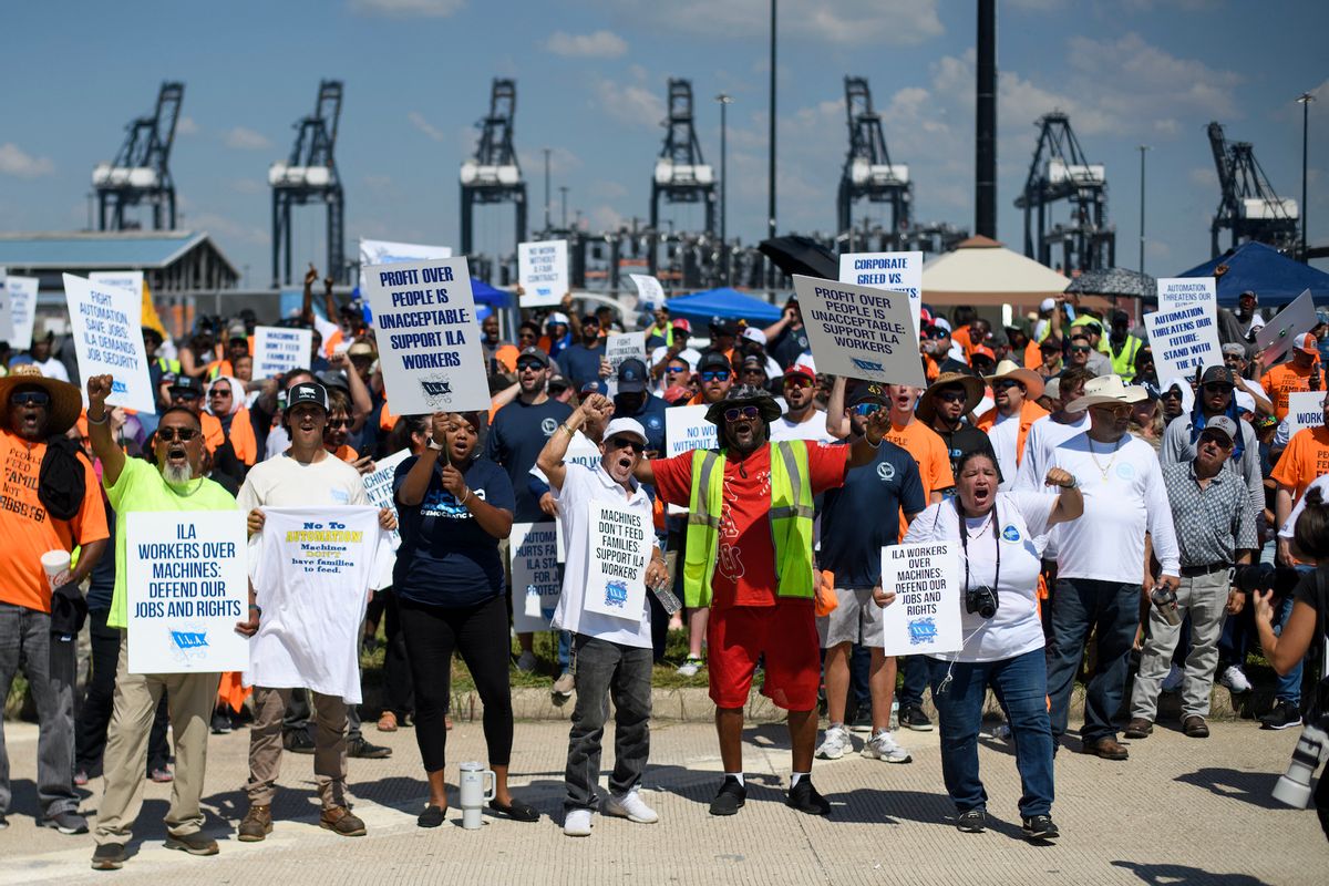 Dockworkers gather at the Bayport Container Terminal in Seabrook, Texas, on October 1, 2024. Officials at 14 ports along the US East and Gulf Coasts were making last-minute preparations on September 30 for a likely labor strike that could drag on the US economy just ahead of a presidential election -- despite last-minute talks. (Photo by Mark Felix / AFP) (Photo by MARK FELIX/AFP via Getty Images)